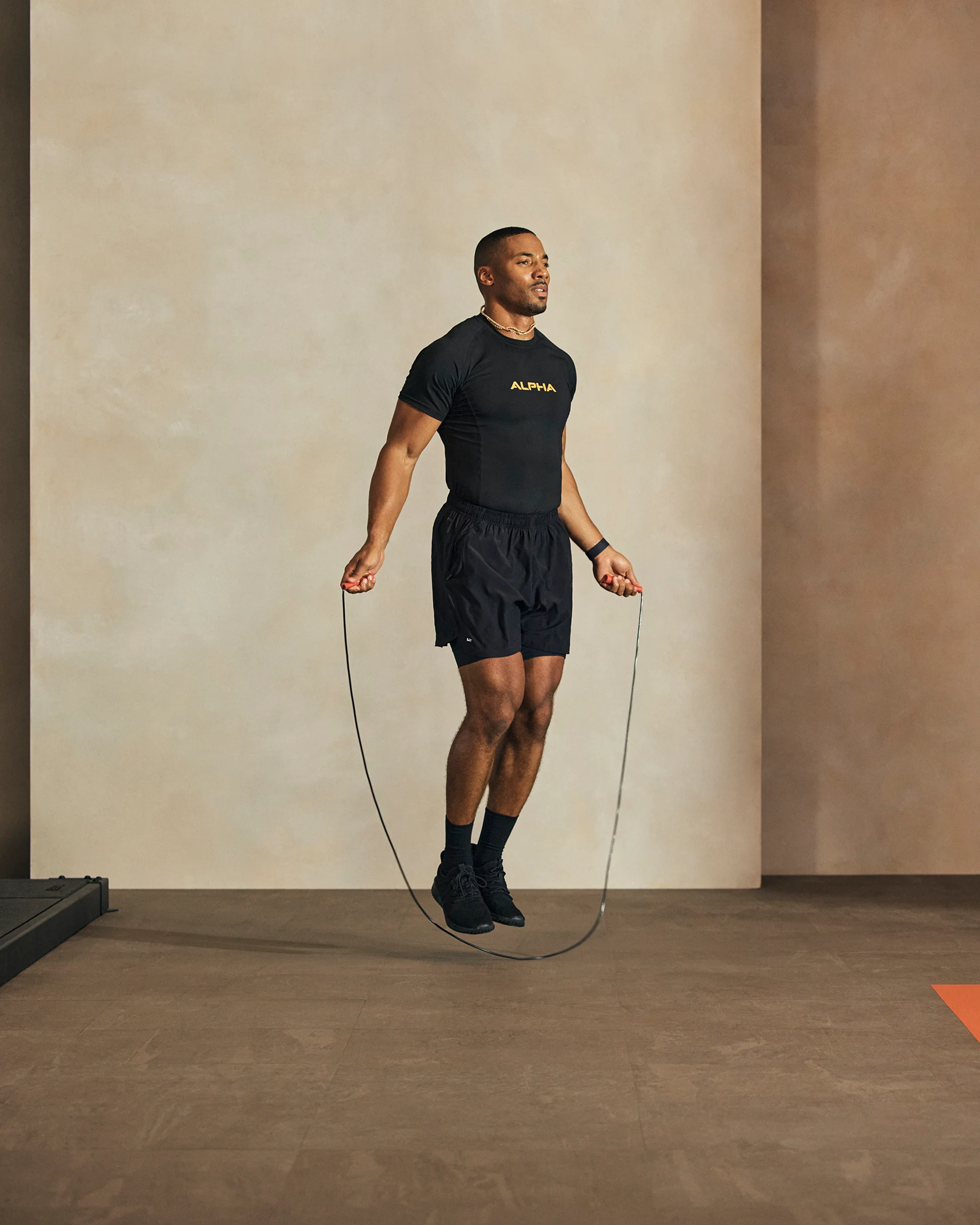 A Life Time member jumping rope in an Alpha class.