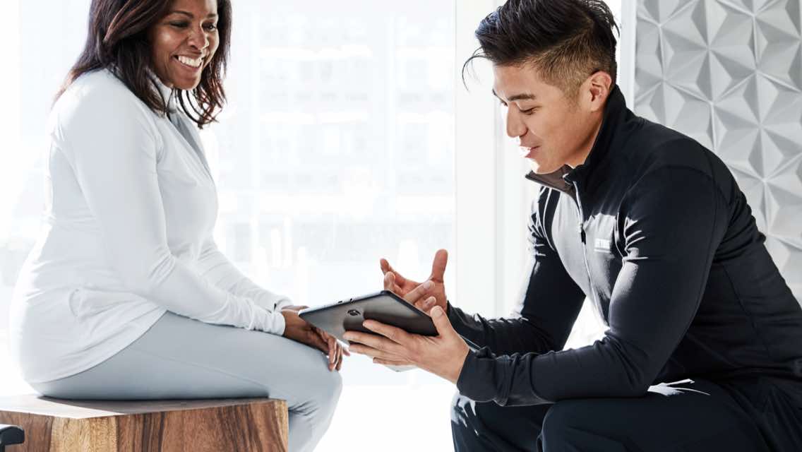 a coach consults with a member