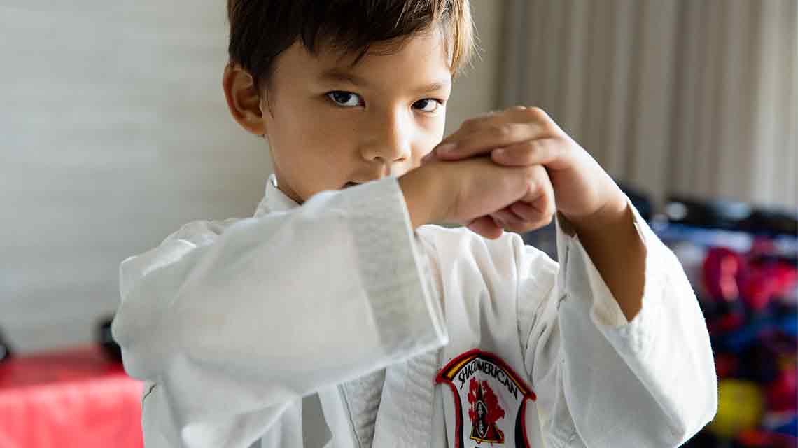 A kid enjoing a fitness class at Life time