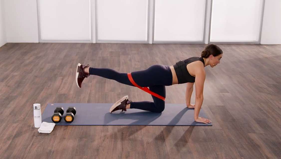 a woman preforms a gluteous maxout move