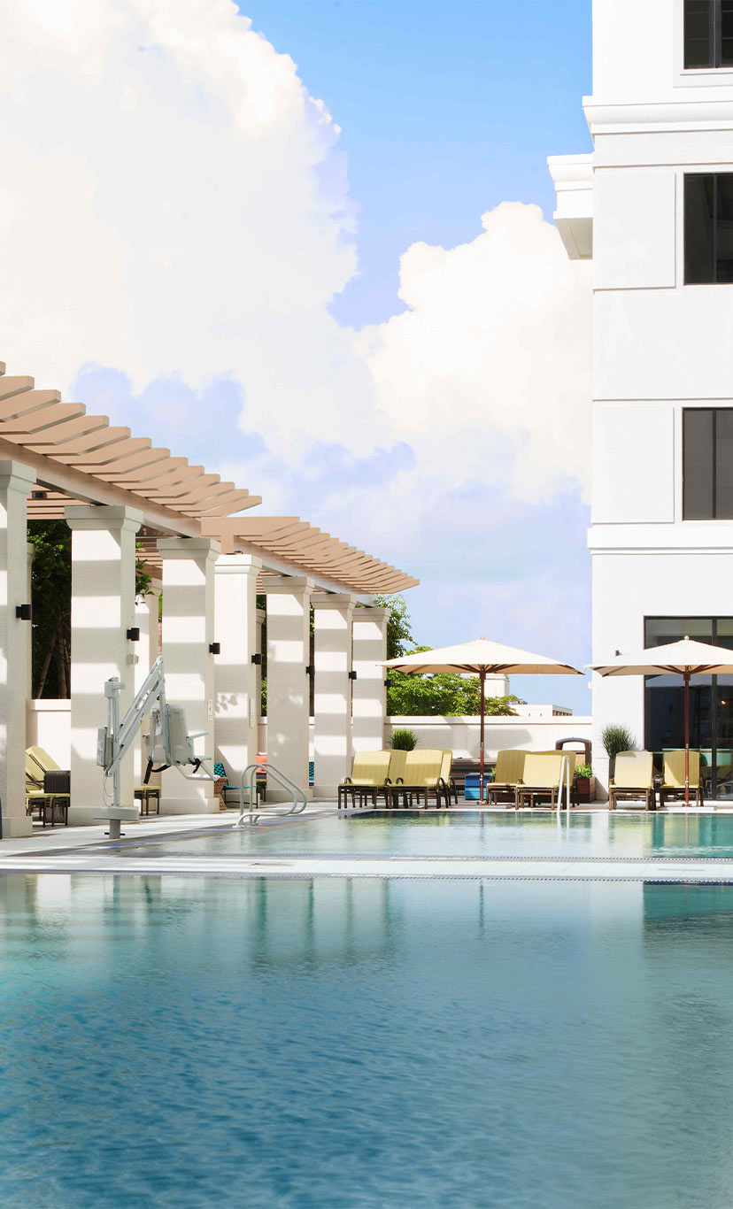 the luxurious outdoor leisure pools at Life Time Coral Gables