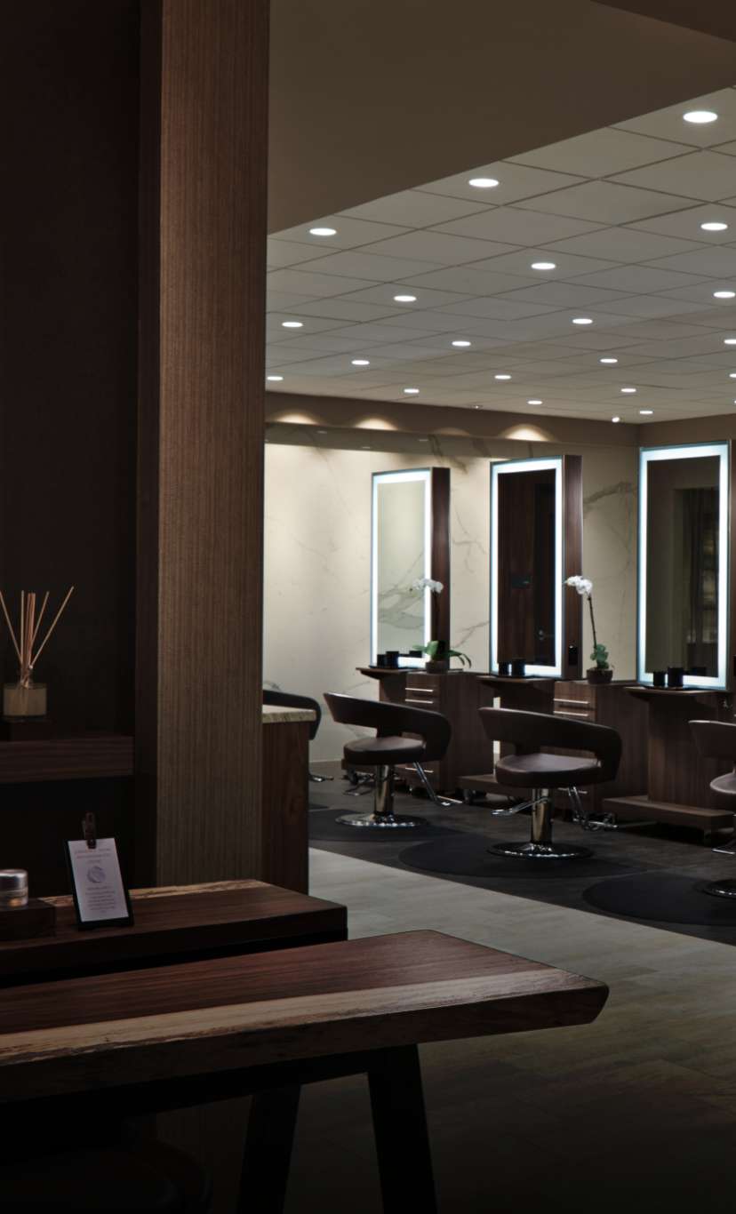 salon chairs and vanities in a salon area