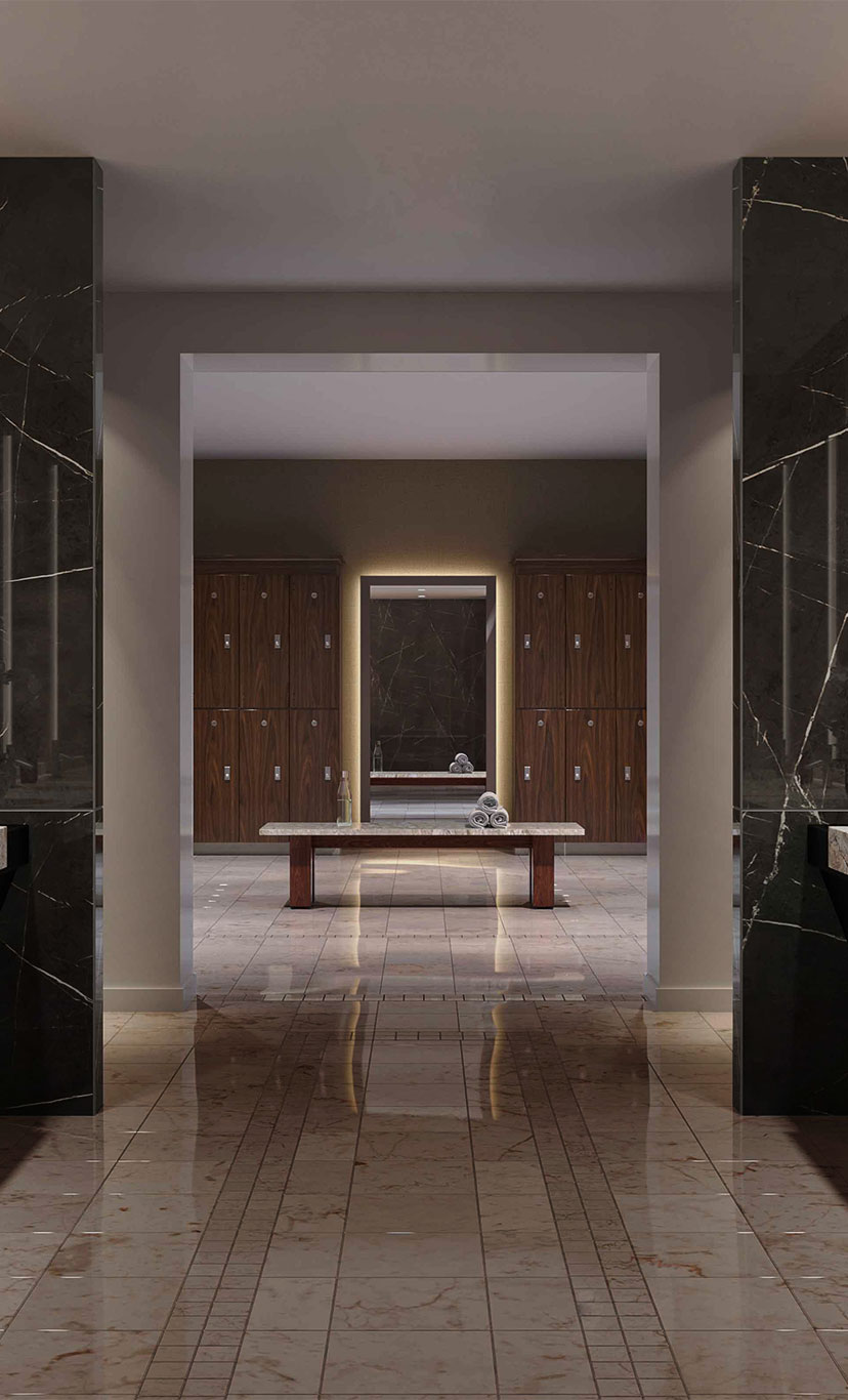 a luxurious locker room with marble and stone features