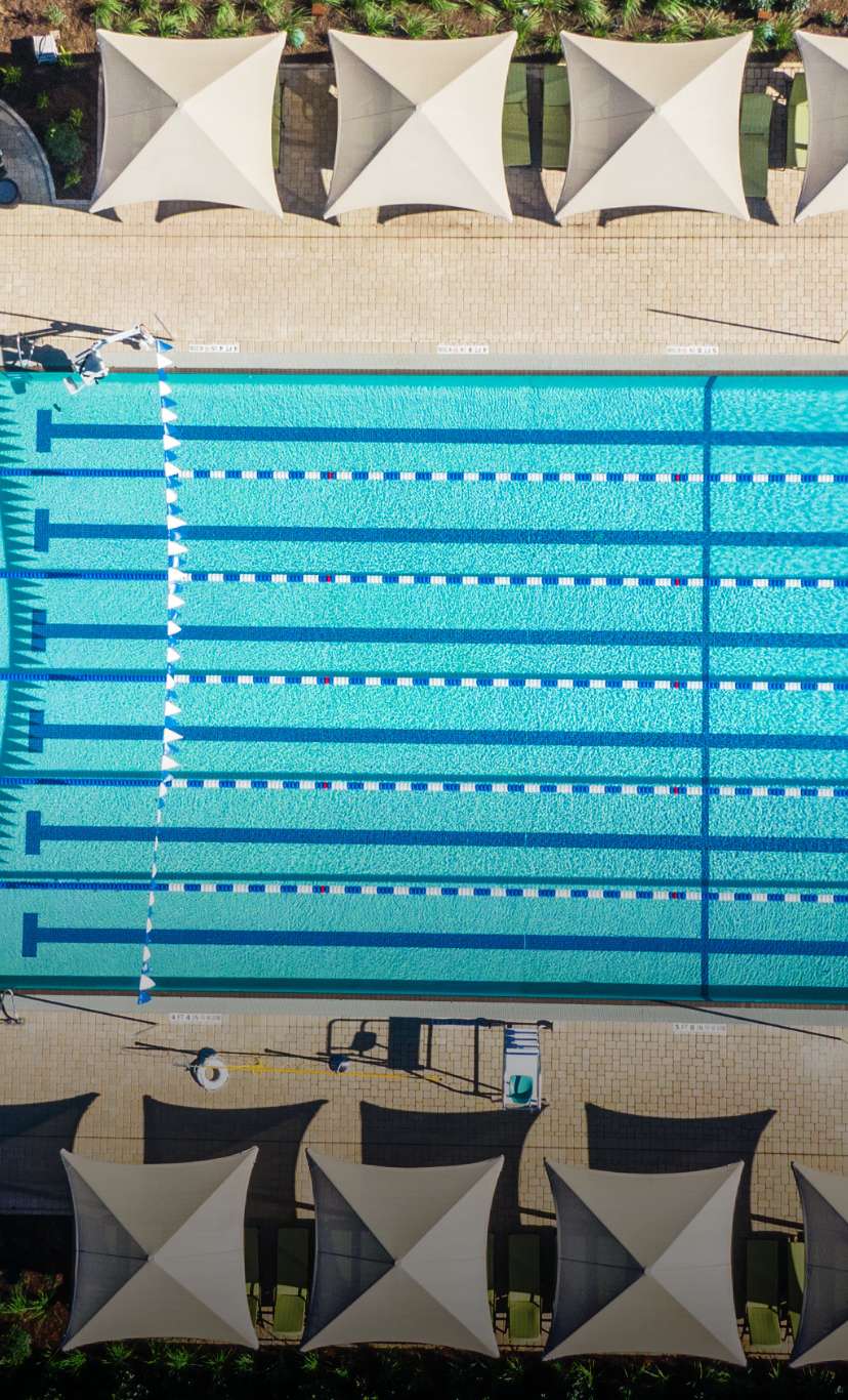 An overhead shot of a 6 lane outdoor lap pool