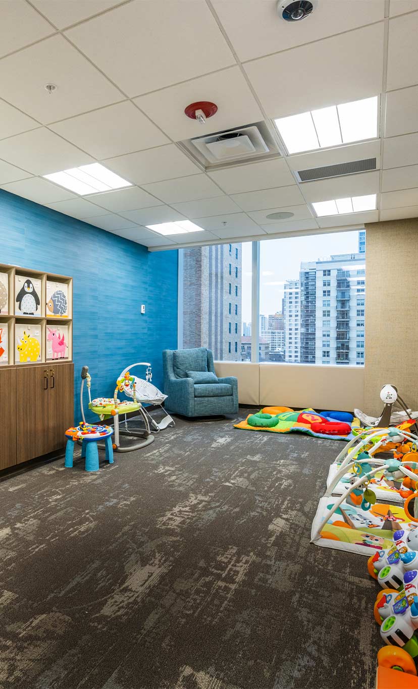 a bright and colorful infant play and care area