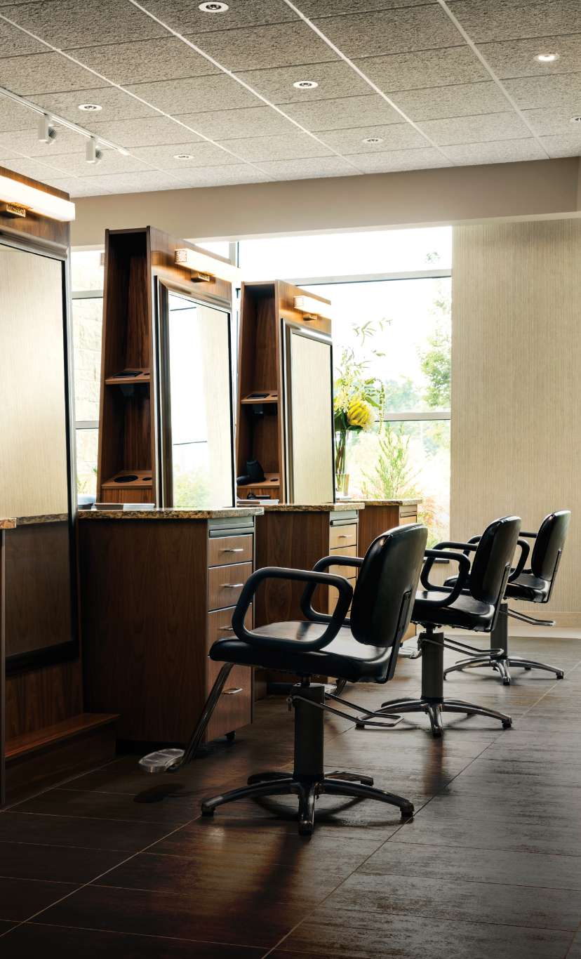 salon chairs and vanities in a salon area