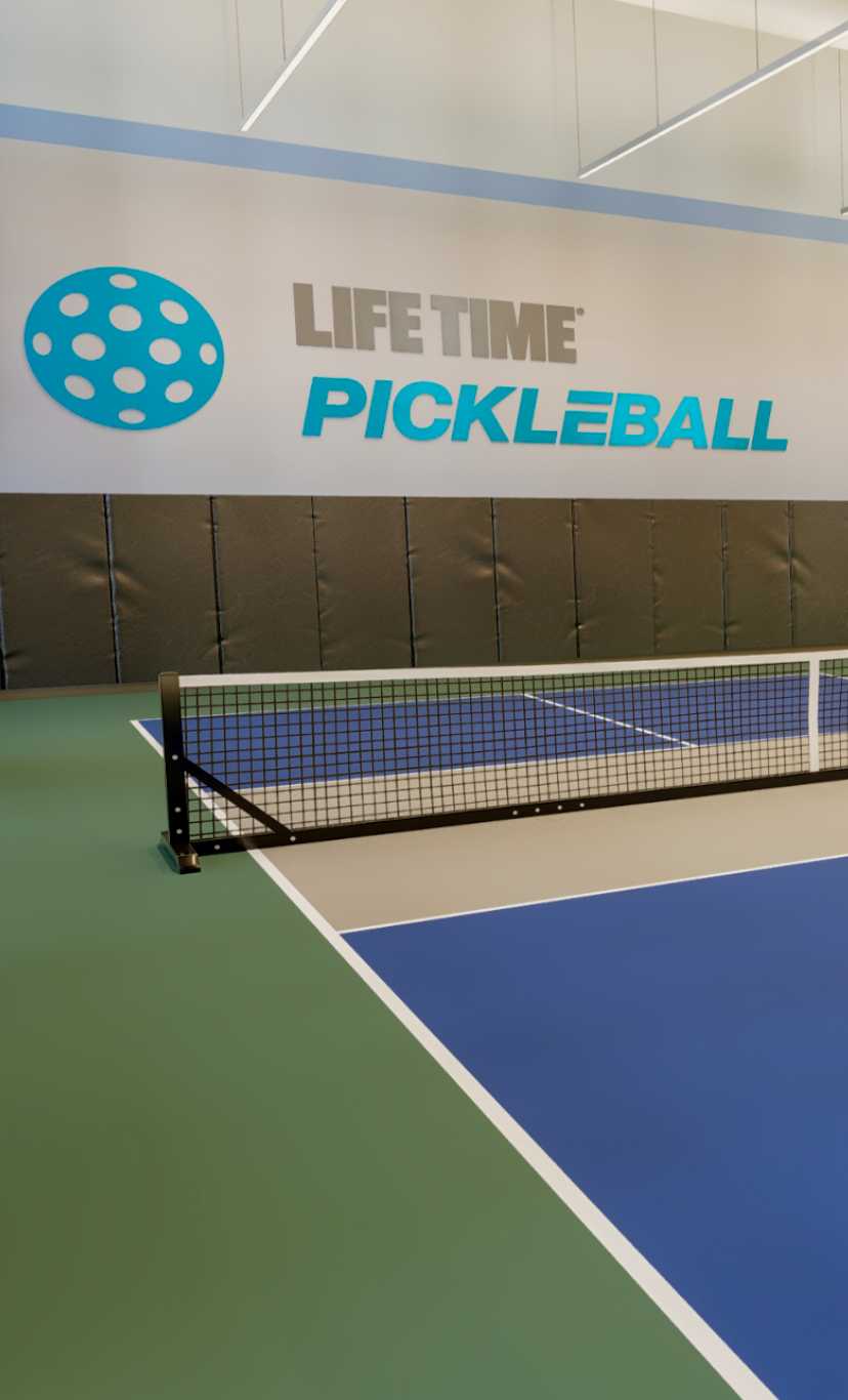 dimly lit indoor pickleball courts