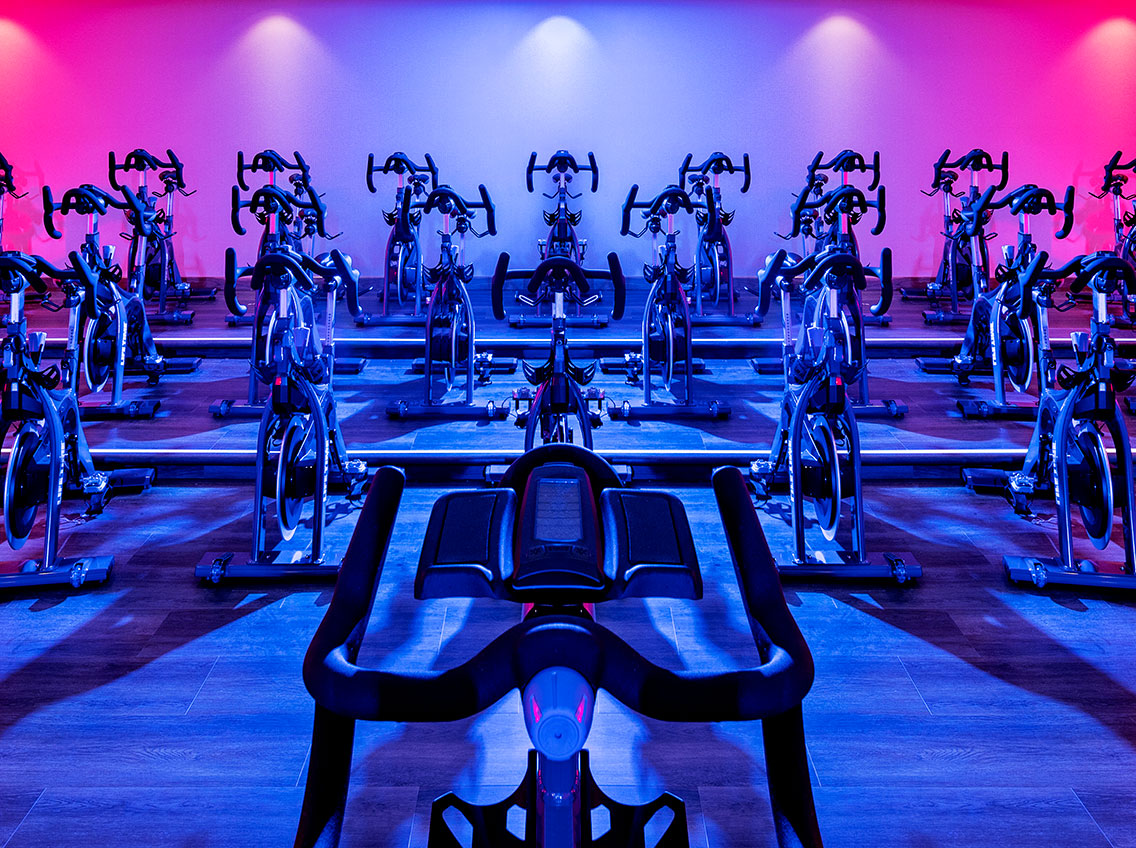 Indoor cycle studio at Life Time Battery Park