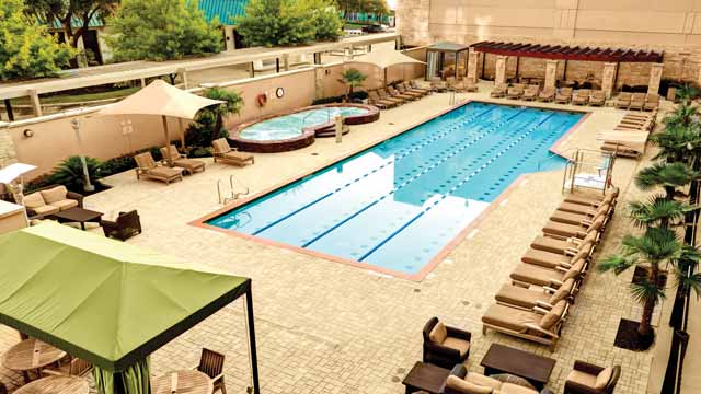 An outdoor lap pool and pool deck