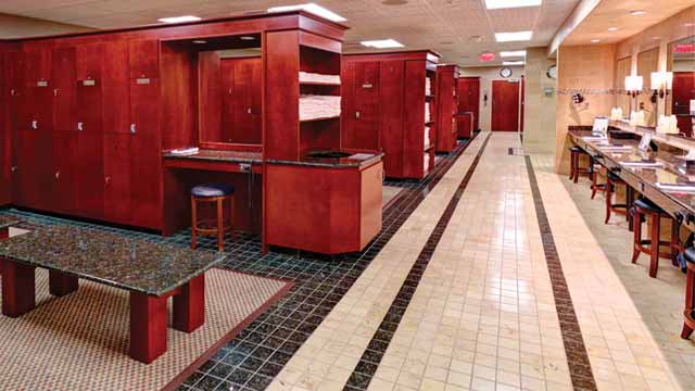A training area including free weights, rowing machines and other quality gym equipment in ample amounts