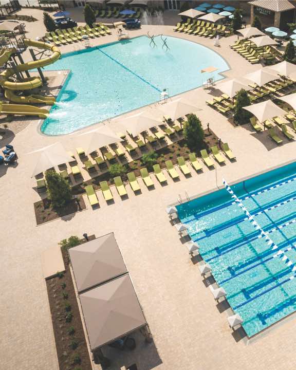 Aerial view of outdoor lap and leisure pools at Life Time