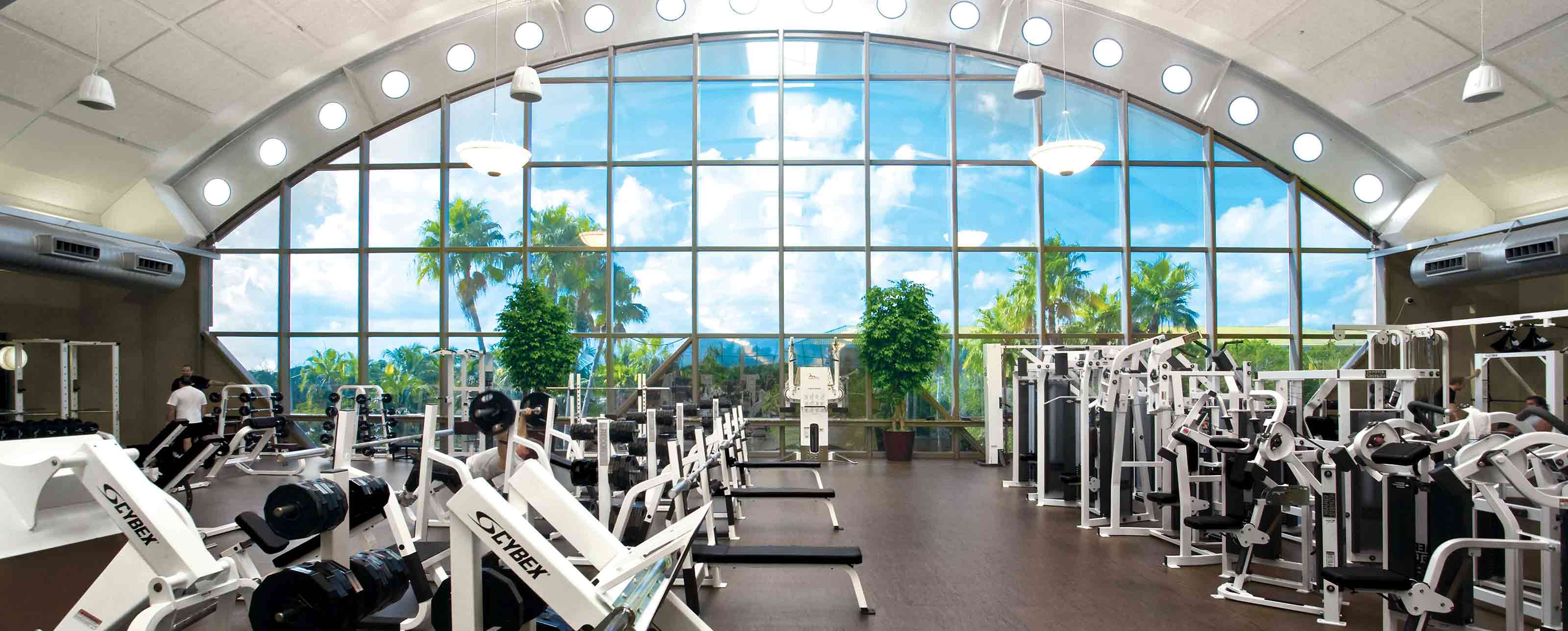 The expansive fitness floor with weight machines at Life Time Boca Raton