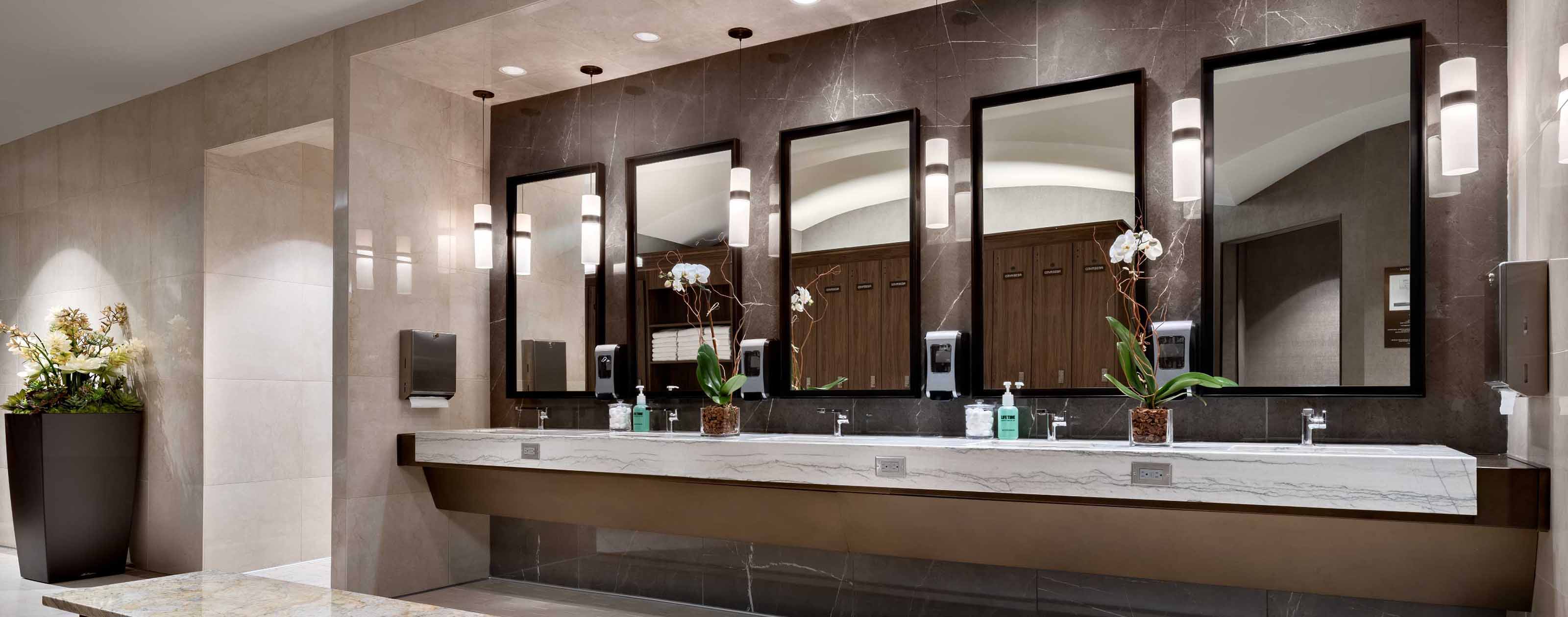 a marble sink and vanity area