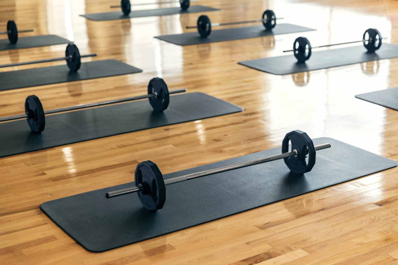 weights on mats in a studio