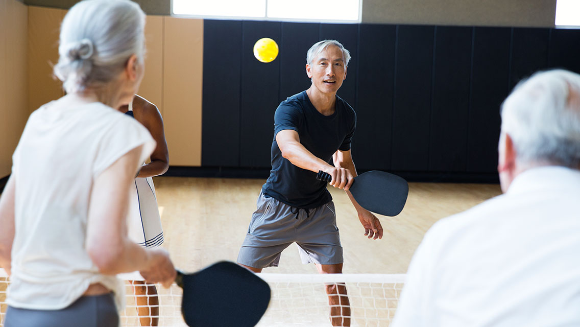 A group of people playing pickleball at Life Time