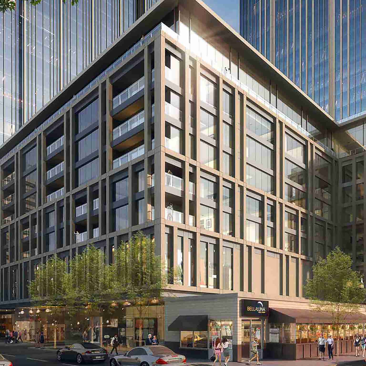 Exterior of a Life Time building with skyscrapers in background.